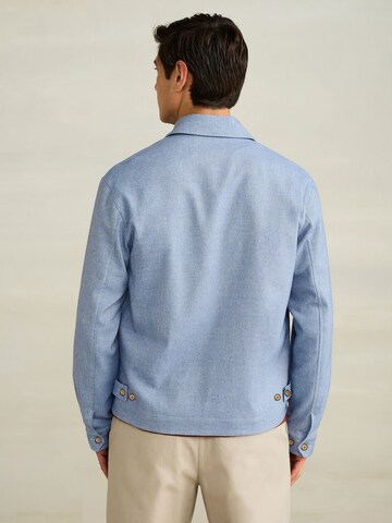 Next Tussenjas in Blauw