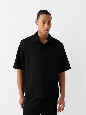 Bershka Regular fit Button Up Shirt in Black: front