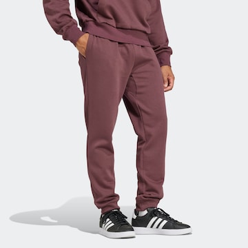 ADIDAS SPORTSWEAR Tapered Sporthose 'FEELCOZY' in Rot
