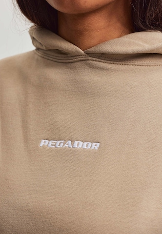 Pegador Collegepaita 'Clarita' värissä beige