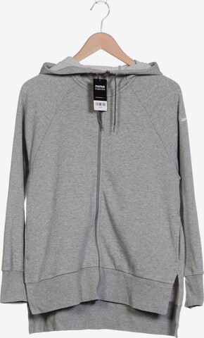 NIKE Kapuzenpullover M in Grau: predná strana