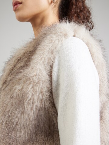 Gilet Gina Tricot en beige