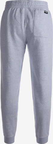 Loosefit Pantalon de sport UNDER ARMOUR en gris