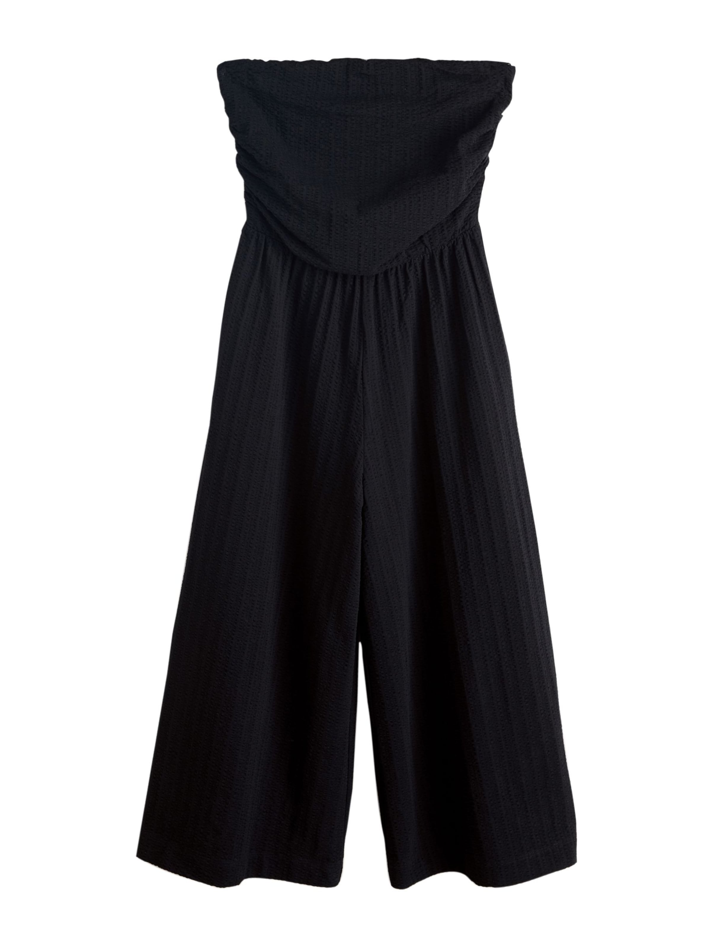 Salopeta de la Next pe negru: față