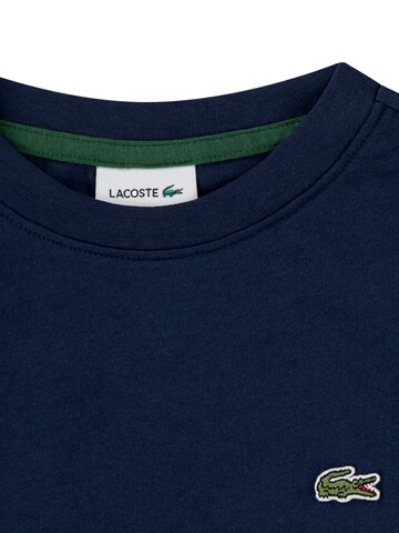 Maglietta di LACOSTE in blu