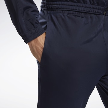 Effilé Pantalon de sport Reebok en bleu