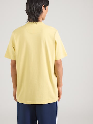 ADIDAS ORIGINALS - Camisa em amarelo: atrás
