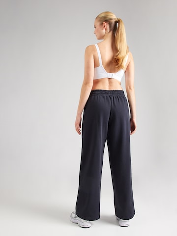 UNDER ARMOUR Wide Leg Sporthose in Schwarz