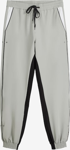Bershka Tapered Pants in Grey: front
