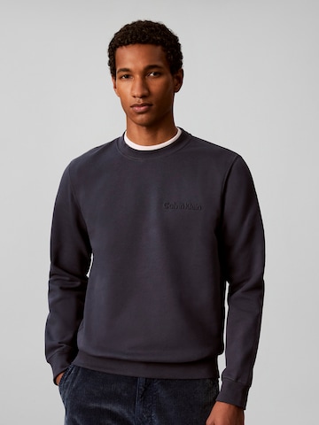 Sweat-shirt Calvin Klein en bleu : devant