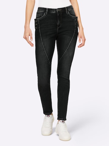 heine Slimfit Jeans i svart: framsida