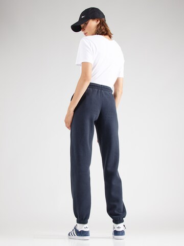 Superdry Tapered Broek 'ESSENTIAL' in Blauw