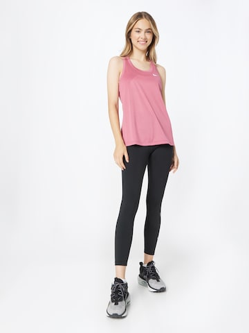 Skinny Pantalon de sport NIKE en noir