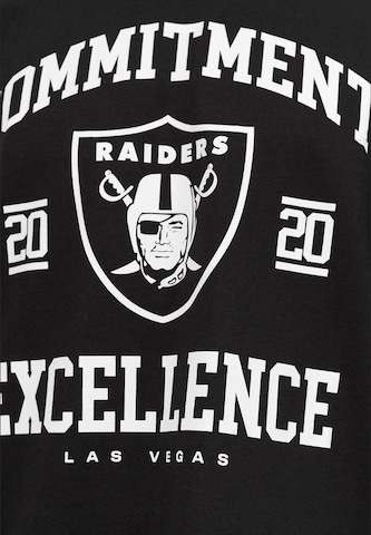 Recovered Sweatshirt 'NFL Raiders Commitment To Excellence Relaxed' in Schwarz