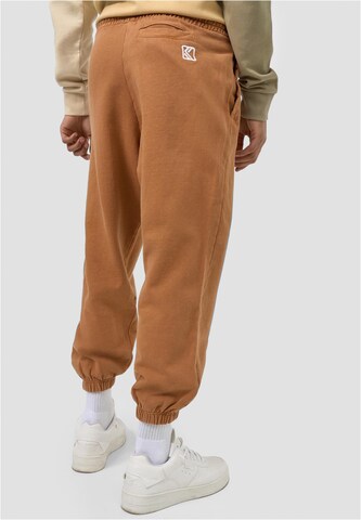 Effilé Pantalon Karl Kani en marron