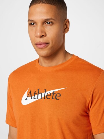 NIKE Regular fit Функционална тениска 'Athlete' в оранжево