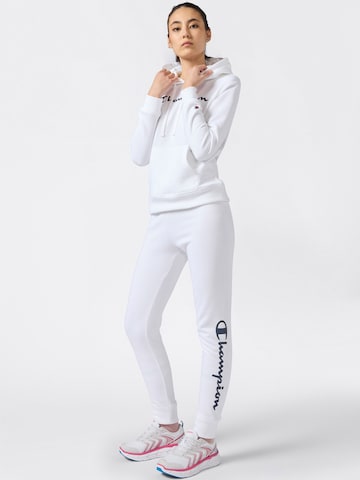 Champion Authentic Athletic Apparel Tapered Trousers in White: front