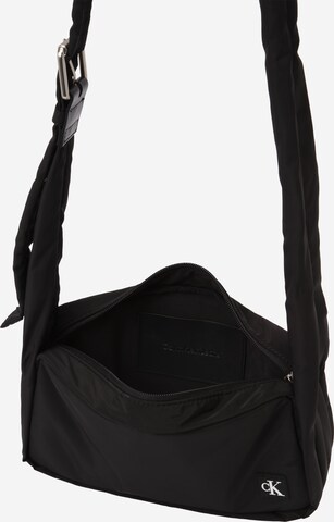 Sac à bandoulière Calvin Klein Jeans en noir