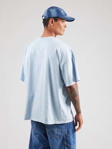 T-Shirt Karl Kani en bleu