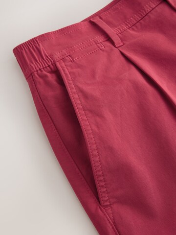 Next - regular Pantalón plisado en rojo