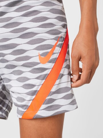 NIKE Regular Sporthose in Grau