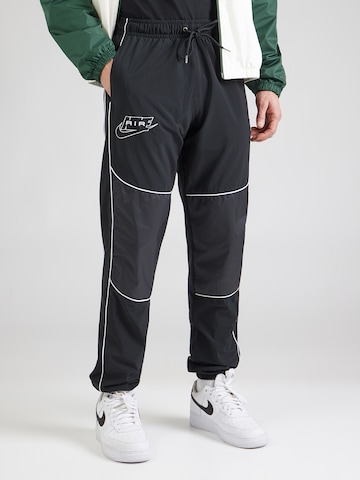 Nike Sportswear Ozke Hlače 'AIR' | črna barva: sprednja stran