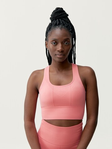 Born Living Yoga Sporttop 'Ambra' in Roze: voorkant