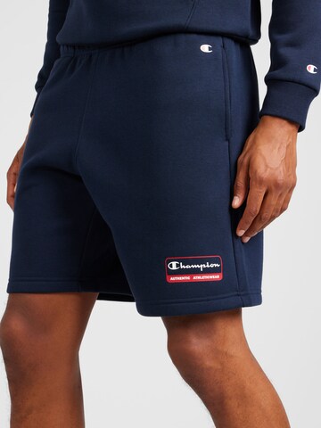 Champion Authentic Athletic Apparel Normalny krój Spodnie w kolorze niebieski
