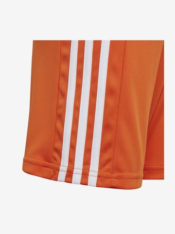 ADIDAS PERFORMANCE Regular Workout Pants in Orange