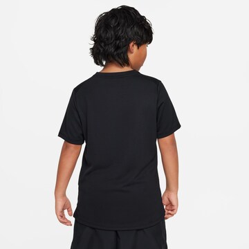 NIKE Koszulka funkcyjna 'MILER' w kolorze czarny