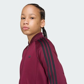 Veste de survêtement 'SST' ADIDAS ORIGINALS en rouge