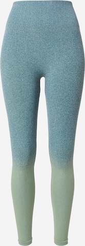 Skinny Pantalon de sport Hummel en vert : devant