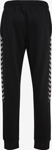 Effilé Pantalon de sport 'Staltic' Hummel en noir