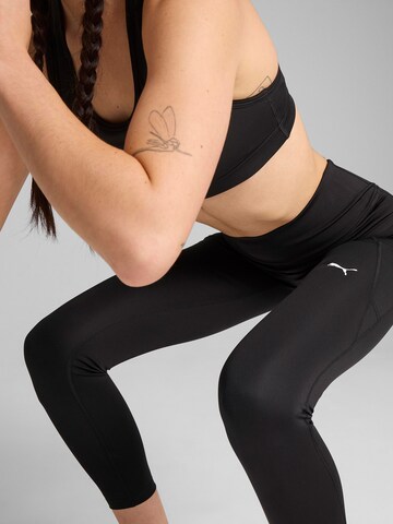 PUMA Skinny Sports trousers 'Tad Essentials' in Black