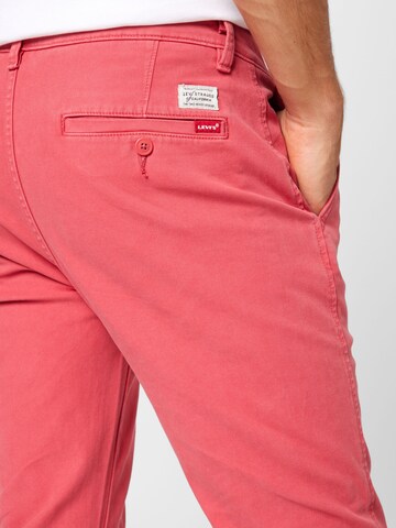 LEVI'S ® - Slimfit Calças chino 'XX Chino Slim Tapered' em rosa