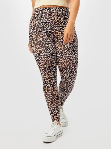 ONLY Carmakoma - Skinny Leggings en marrón: frente