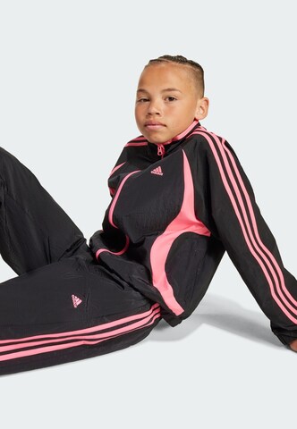 Tapered Pantaloni 'Teamgeist' di ADIDAS ORIGINALS in nero