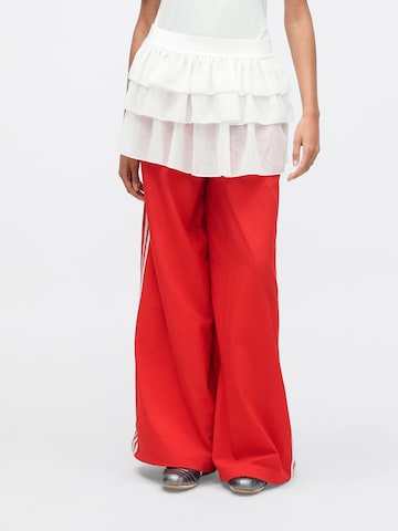 ADIDAS ORIGINALS - Bootcut Pantalón 'FB' en rojo: frente