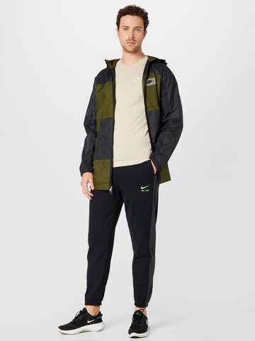 Nike Sportswear Tapered Παντελόνι σε μαύρο