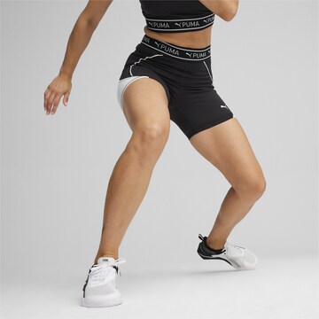 PUMA Skinny Fit Спортен панталон 'TRAIN STRONG 5' в черно: отпред