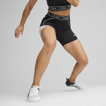 PUMASkinny Sportske hlače 'TRAIN STRONG 5' - crna boja: prednji dio