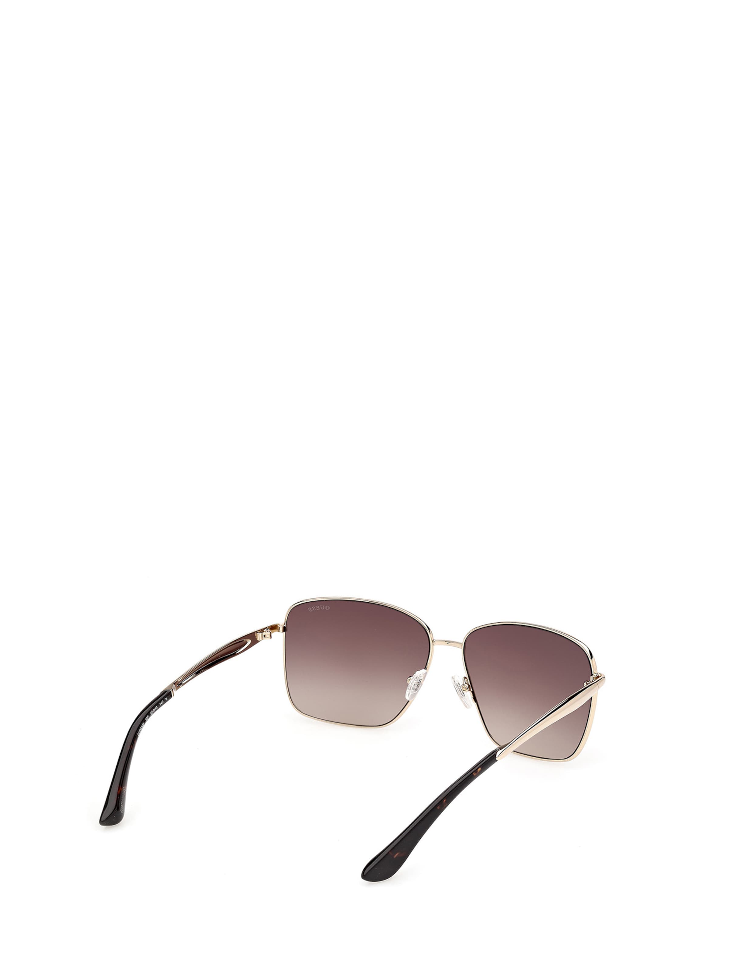 GUESS Sunglasses in Gold