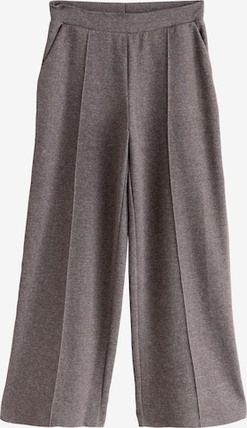 pilka Next Plačios klešnės Kelnės: priekis