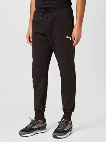 PUMA - Tapered Calças de desporto em preto: frente