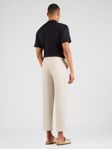 smėlio River Island Siaurėjantis Kelnės