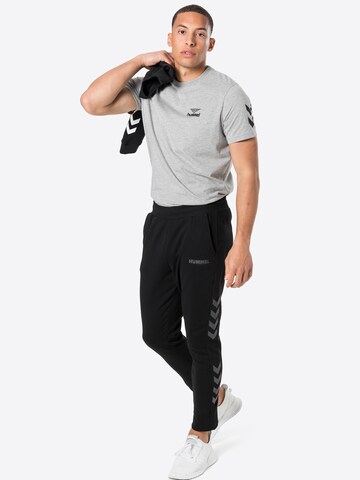 Tapered Pantaloni sportivi 'Legacy' di Hummel in nero