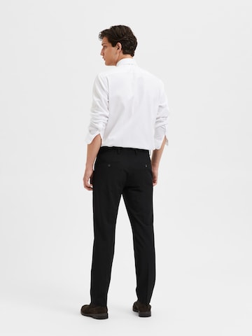 Coupe slim Pantalon à plis 'Liam' SELECTED HOMME en noir