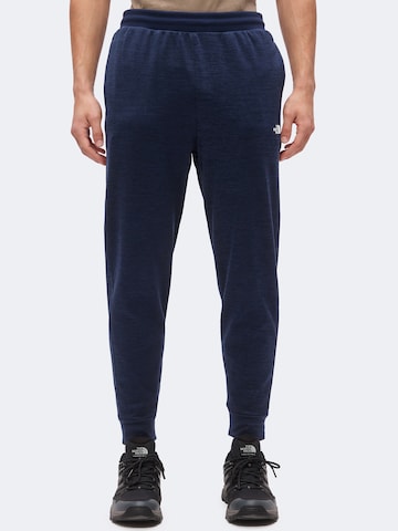 THE NORTH FACE Tapered Urheiluhousut värissä sininen: etupuoli