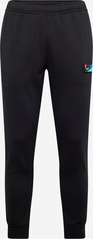 Effilé Pantalon 'CLUB' Nike Sportswear en noir : devant