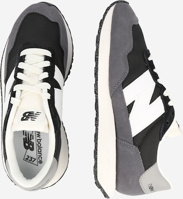 Baskets basses '237' new balance en noir